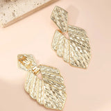 Maya | Vintage-style metallic wave leaf clip earrings