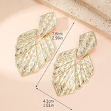 Maya | Vintage-style metallic wave leaf clip earrings