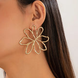 Elara | Large metal hollow flower stud earrings